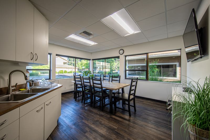 Staff break room with a kitchen and dining table